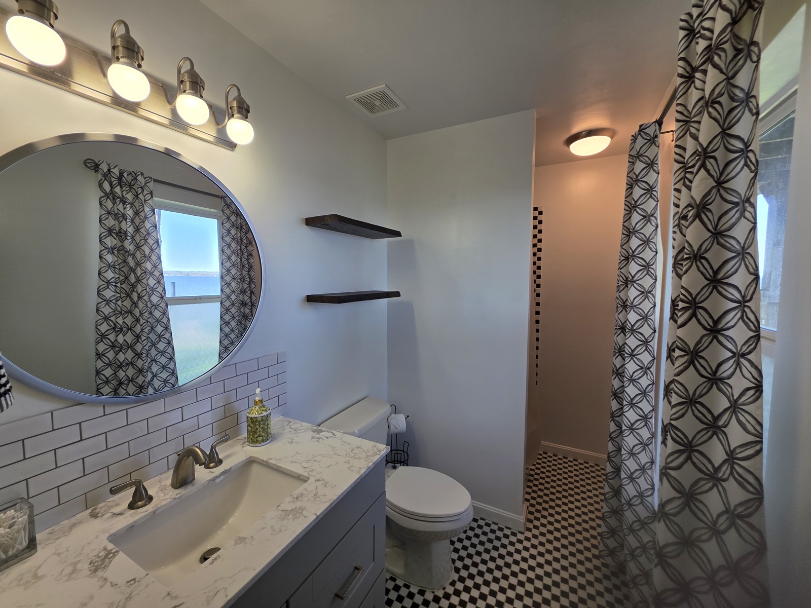 Ensuite vanity and checkered floor